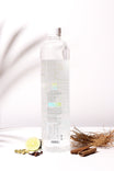 Clear bottle with a label on a white background
